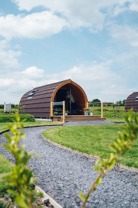 anglesey pod with a small path leading up to it