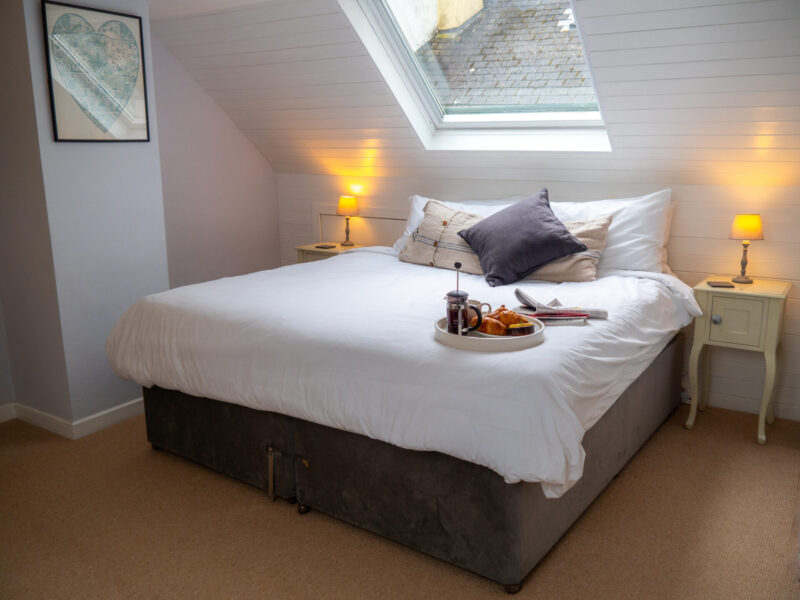 Crows Nest Bedroom ,Bright, cosy bedroom with breakfast tray Crow’s Nest with ensuite Superking or 2 Single - high quality linen and Noble Isle toiletries introduce a quiet, hotel level ease. no3-old-school-house-cawsand-cornwall-beach-house-sea view -garden-view.jpg Cawsand, Cornwall, UK Latitude ~50.333, Longitude ~-4.200 .jpg