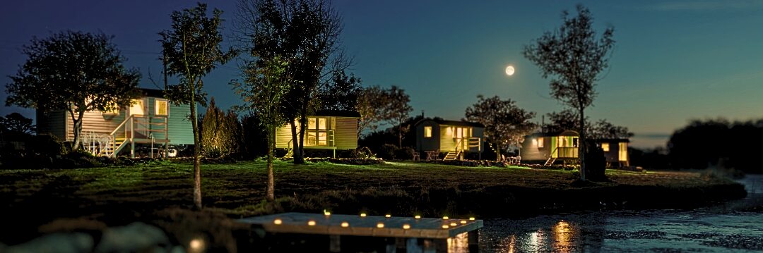Shepherd huts at night under dark skies | luxury glamping cabins | adults only | dog friendly | North Wales Coast | Snowdonia